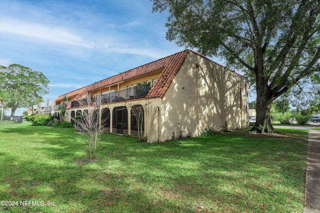 exterior space with a lawn