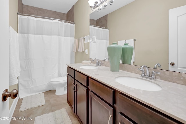 bathroom with tile patterned flooring, vanity, toilet, and a shower with shower curtain