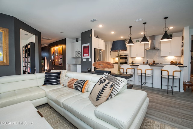 living room with hardwood / wood-style flooring