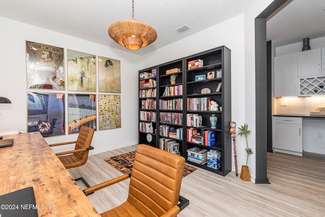 office area featuring light hardwood / wood-style flooring