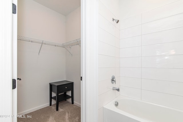 bathroom with shower / tub combination