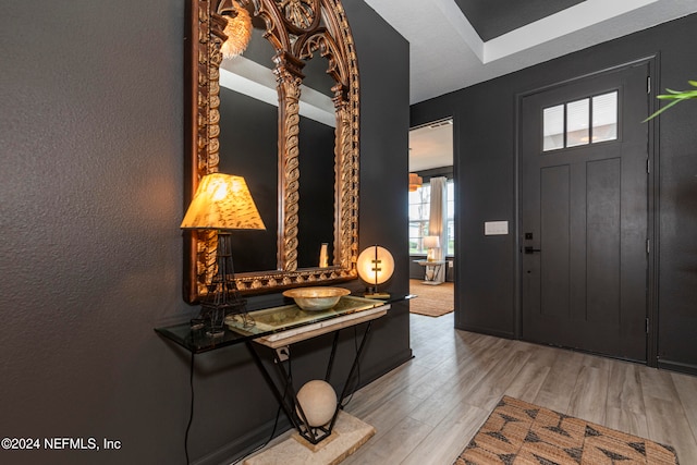 foyer with light wood-type flooring