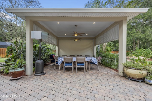 view of patio / terrace featuring ceiling fan