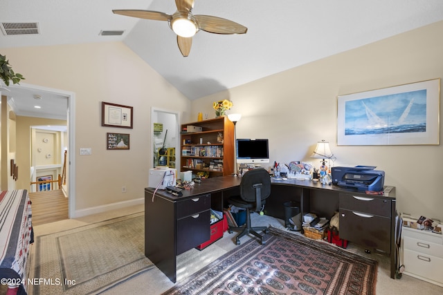 office area with light hardwood / wood-style flooring, ceiling fan, and lofted ceiling