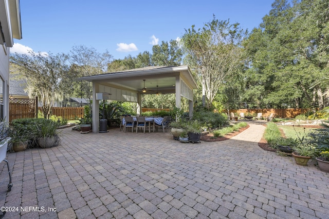 view of patio with ceiling fan