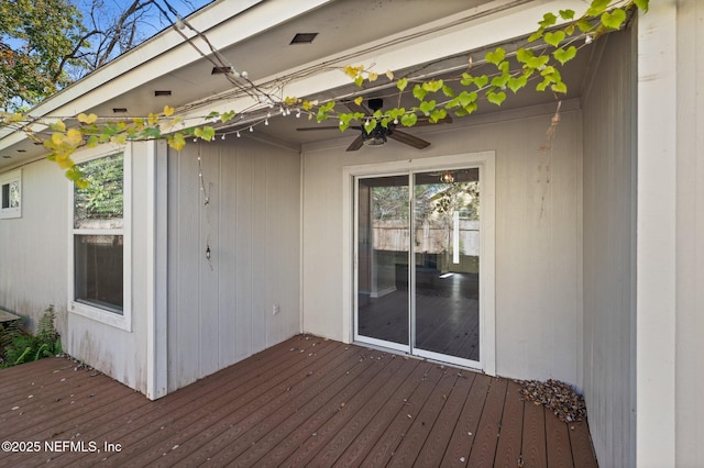 wooden deck with ceiling fan