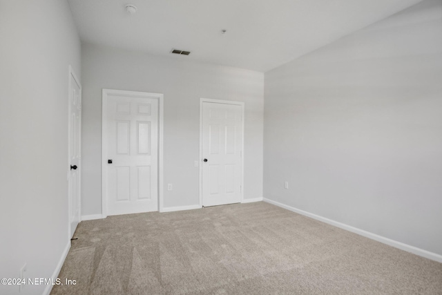 unfurnished bedroom with carpet floors