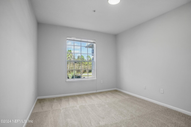 empty room with carpet flooring