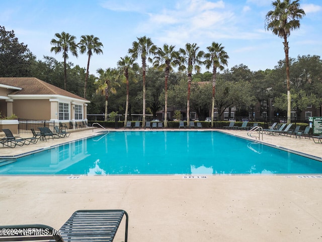 view of pool featuring a patio area