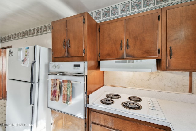 kitchen featuring white appliances