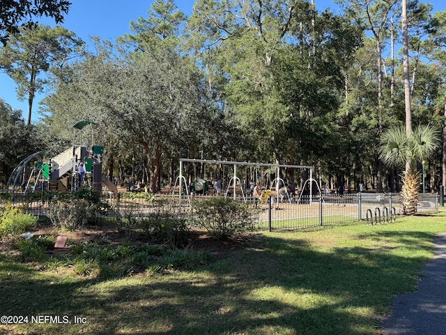 view of jungle gym featuring a yard