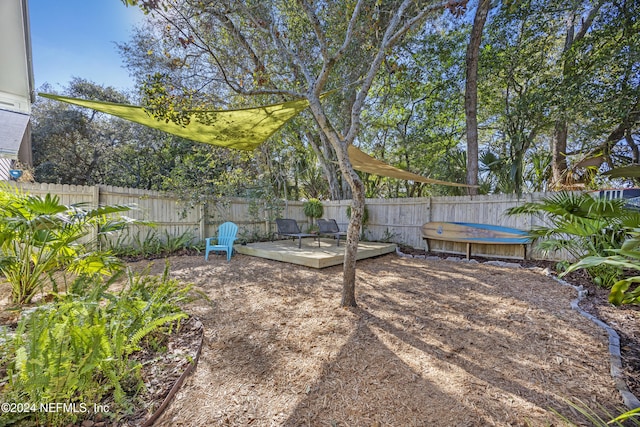 view of yard with a deck