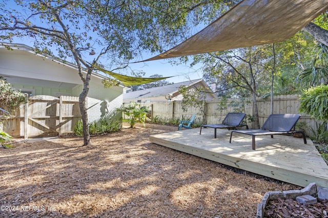 view of yard with a deck