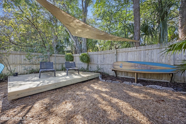 exterior space featuring a wooden deck