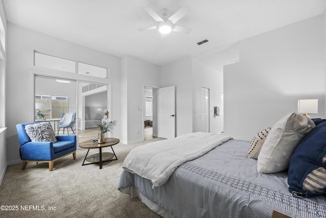 carpeted bedroom featuring ceiling fan and a closet