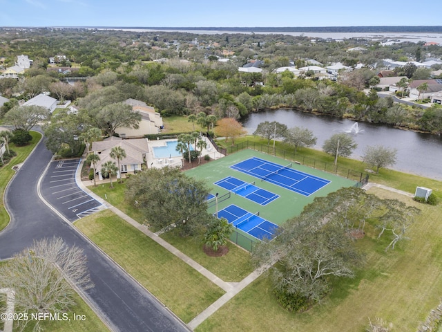 birds eye view of property featuring a water view