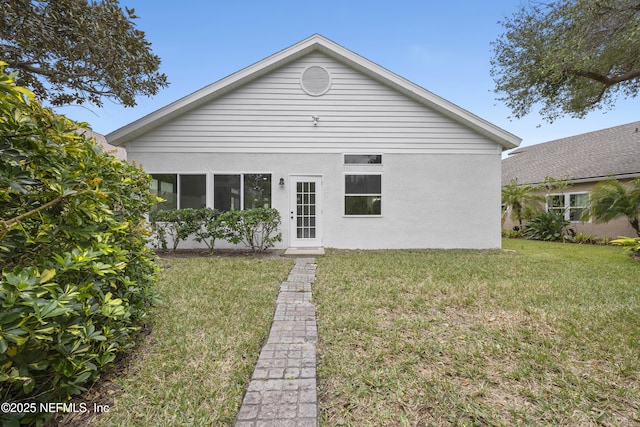 view of front of home with a front lawn