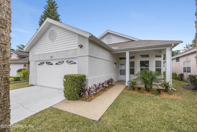 single story home with a front yard and a garage