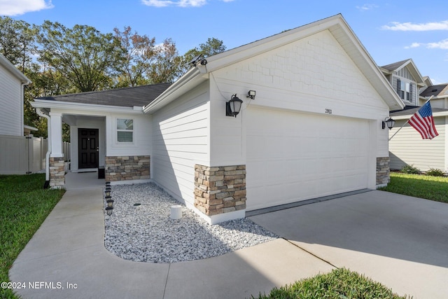 view of front of home with a garage