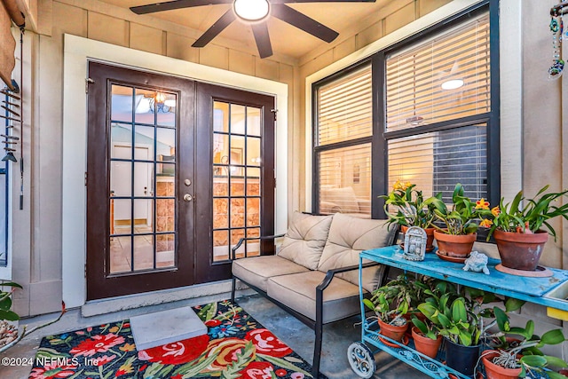 view of exterior entry featuring french doors and ceiling fan