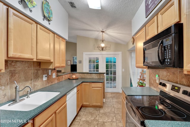 kitchen with stainless steel range with electric stovetop, lofted ceiling, french doors, white dishwasher, and sink