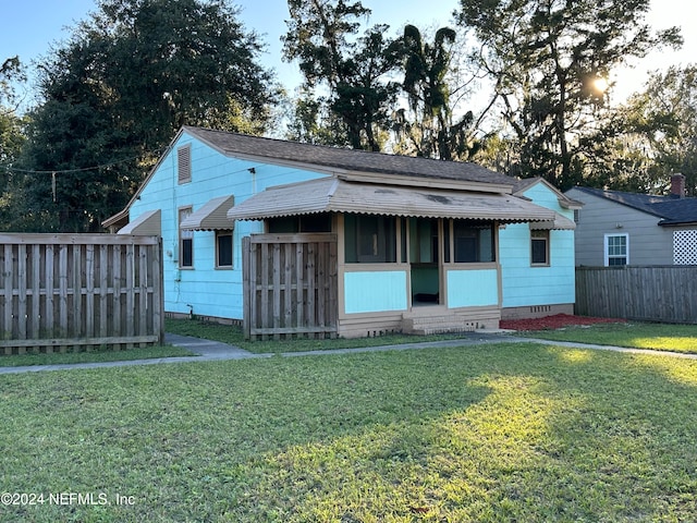 exterior space with a front yard