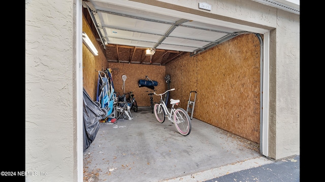 garage featuring a garage door opener