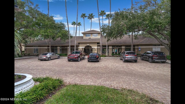 19 Arbor Club Dr Unit 317, Ponte Vedra Beach, FL 32082 - view of property featuring uncovered parking
