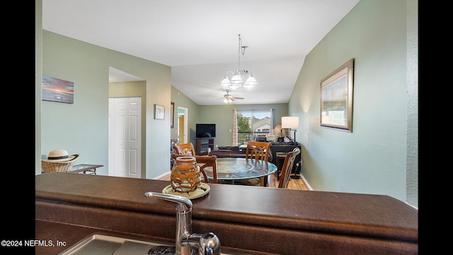 19 Arbor Club Dr Unit 317, Ponte Vedra Beach, FL 32082 - dining area with lofted ceiling, a chandelier, ceiling fan, and baseboards