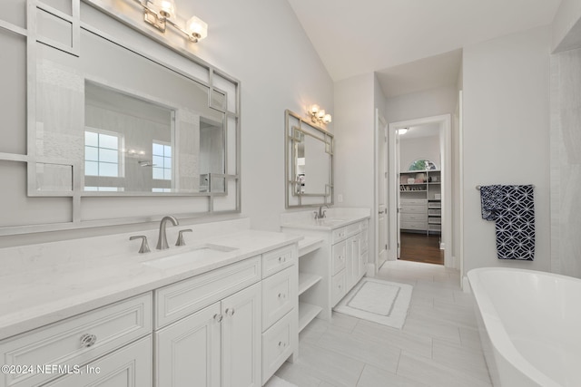 bathroom with a bathtub and vanity