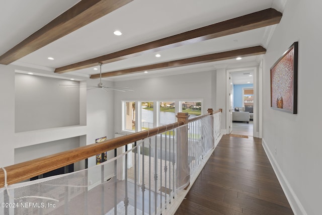 hall featuring beam ceiling and dark wood-type flooring