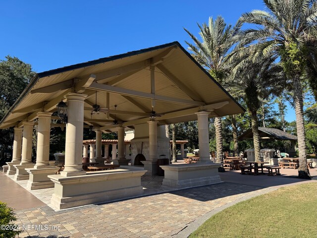 view of home's community with a gazebo and a patio area