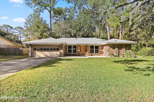 ranch-style house with a front lawn and a garage