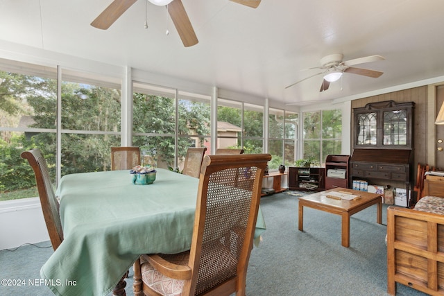 sunroom / solarium with ceiling fan