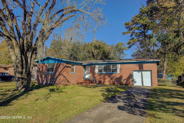 ranch-style house featuring a garage, driveway, brick siding, and a front lawn