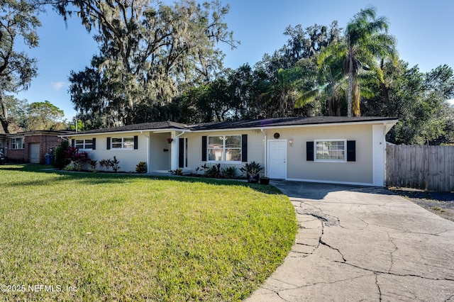 ranch-style house with a front yard