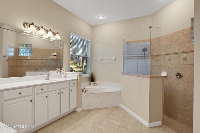 2176 Autumn Cove Cir, Fleming Island, FL 32003 - bathroom featuring a bath, vanity, a walk in shower, and tile patterned flooring