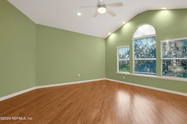 2176 Autumn Cove Cir, Fleming Island, FL 32003 - spare room with wood finished floors, vaulted ceiling, ceiling fan, and recessed lighting