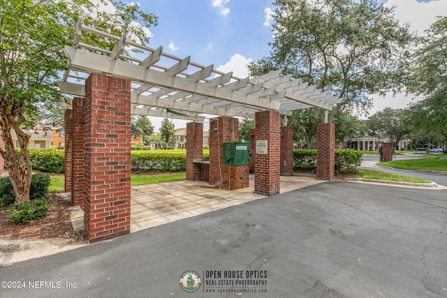 exterior space featuring a pergola