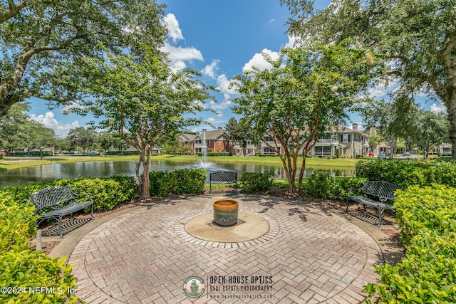 view of patio / terrace featuring a water view