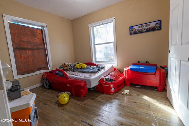 bedroom featuring light hardwood / wood-style floors