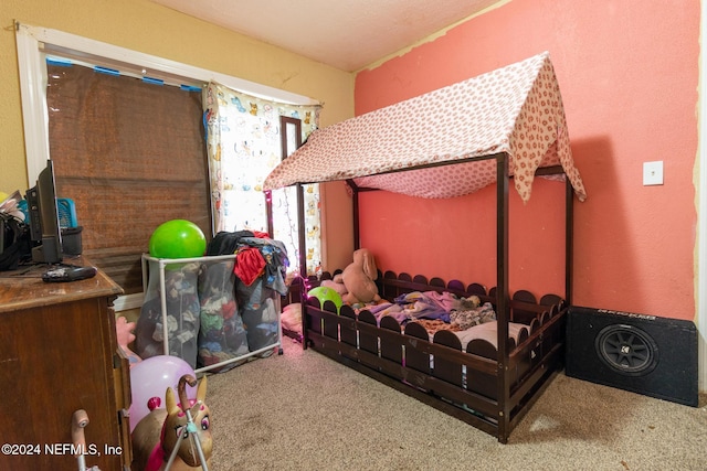 bedroom featuring carpet flooring