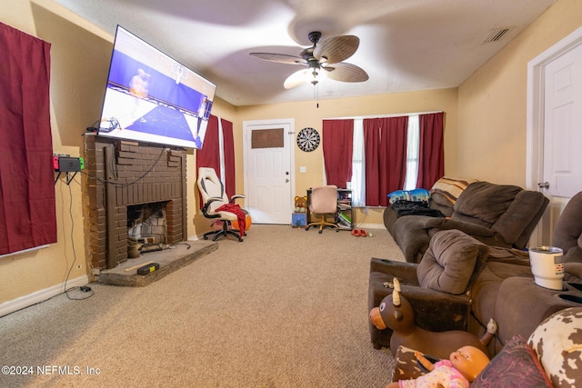 living room with ceiling fan and carpet floors