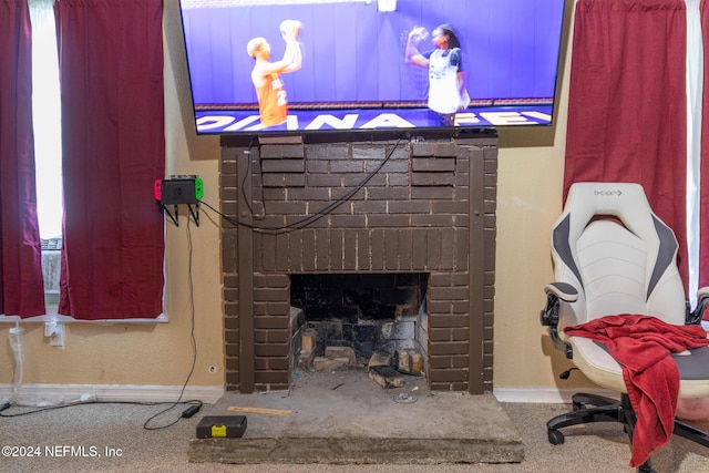 details featuring carpet flooring and a brick fireplace