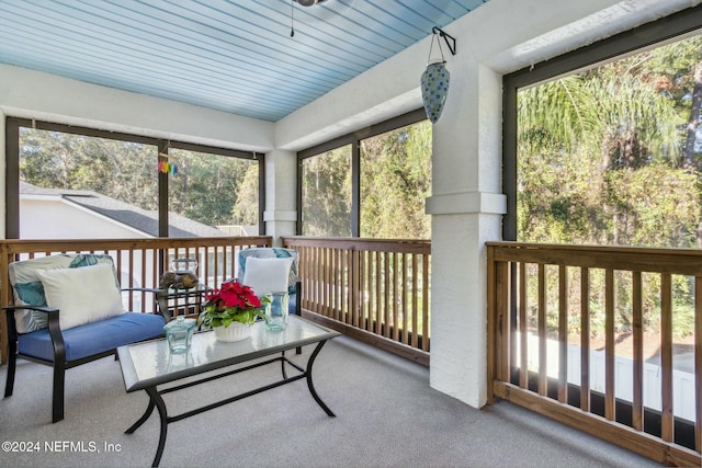 sunroom with wood ceiling