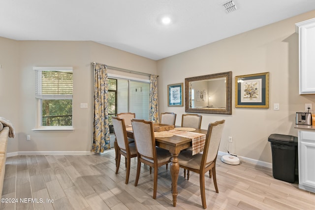 dining space featuring light hardwood / wood-style flooring