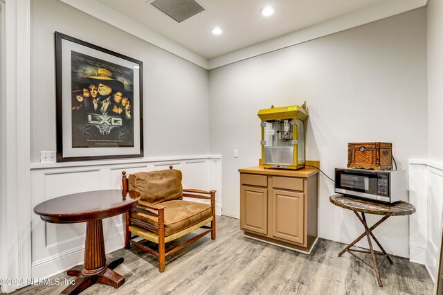 sitting room featuring light wood-type flooring