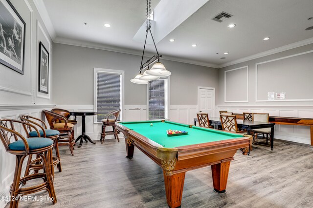 rec room featuring wood-type flooring, crown molding, and billiards