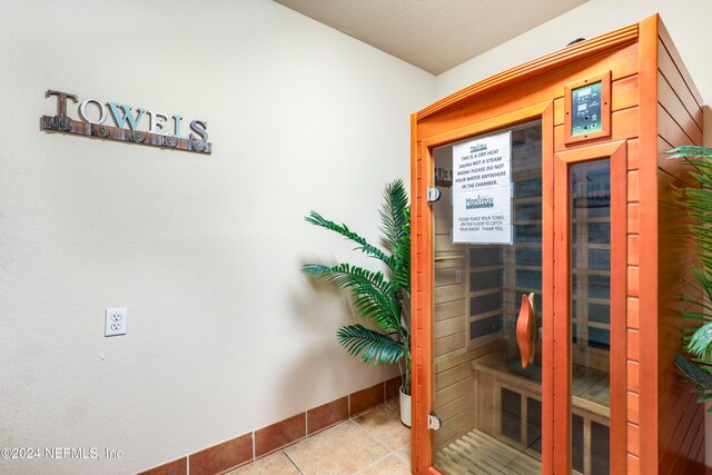 view of sauna / steam room featuring tile patterned floors