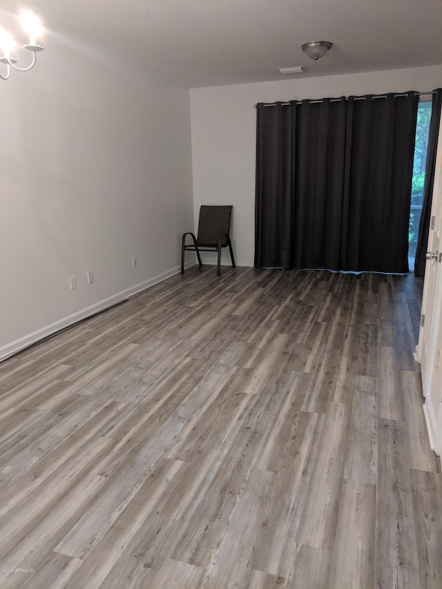 unfurnished room featuring light wood-type flooring